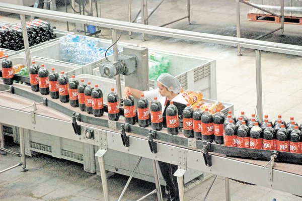 Familia Mubarak pone en venta Mc Cola: gigante mundial de bebidas B en carrera