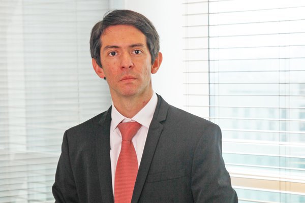Economistas creen que recorte en pronóstico de IPC aplaza alza de tasas
