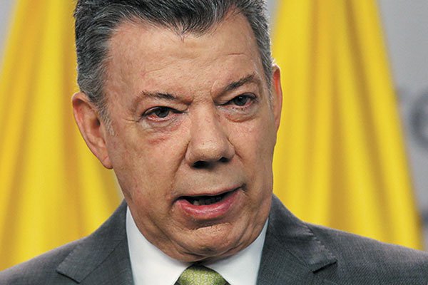 Santos y Gurría firman en París la entrada de Colombia en la OCDE