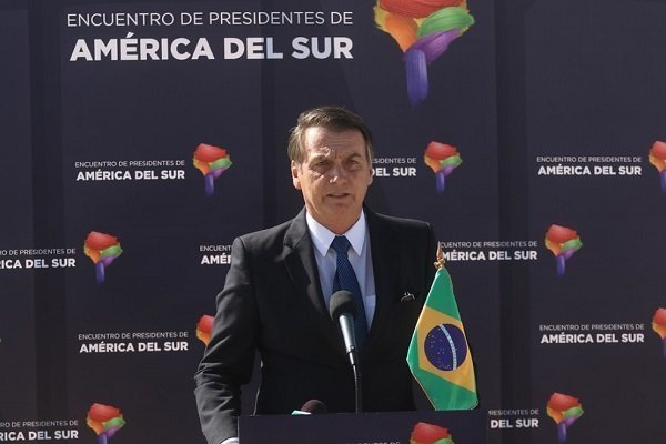Bolsonaro llega al país y asegura que "no vino a hablar de Pinochet"