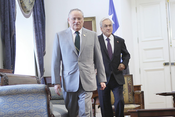Piñera ratifica intención de reducir de diez a nueve los ministros del TC