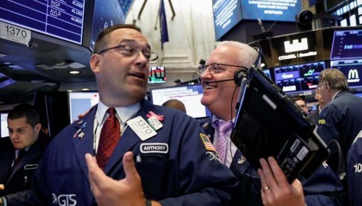 <p>Wall Street registra mayor salto desde mayo de 2020 tras reunión de la Fed</p>