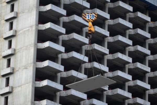 La mayor constructora de China advierte de una fuerte caída en sus utilidades en medio de crisis del sector