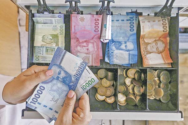 Rebaja del impuesto corporativo a 18% dejaría a Chile entre las tasas más bajas de la OCDE, pero abre dudas por su impacto fiscal